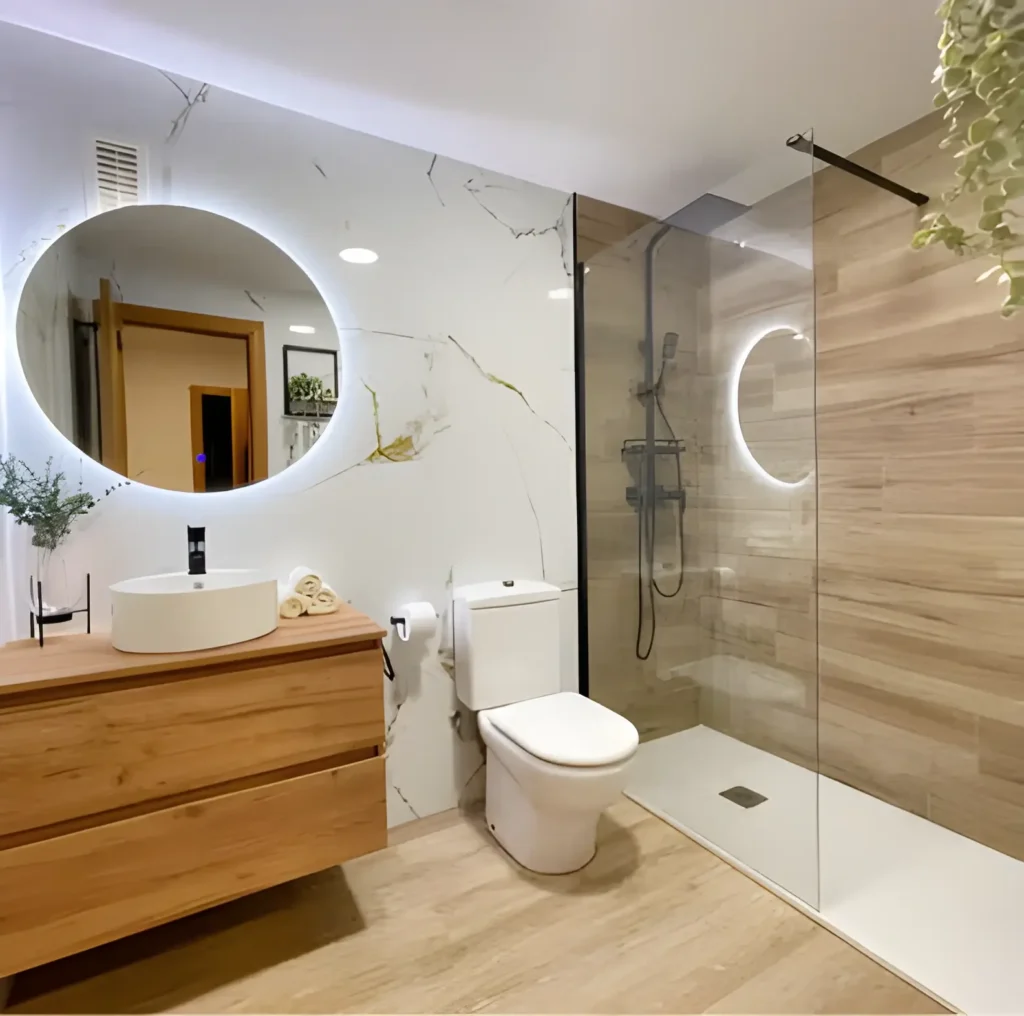 Baño reformado en Sabadell con mampara y grifería nueva